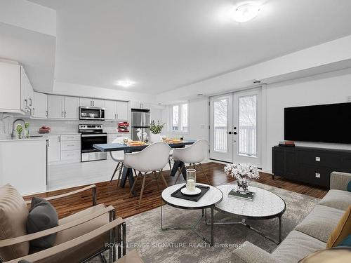 3-2374 Gerrard St E, Toronto, ON - Indoor Photo Showing Living Room