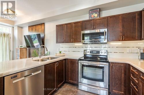 82 Cole Street, Hamilton (Waterdown), ON - Indoor Photo Showing Kitchen With Stainless Steel Kitchen With Double Sink