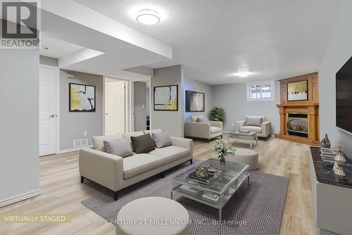 8 - 615 Nelson Street W, Norfolk, ON - Indoor Photo Showing Living Room With Fireplace