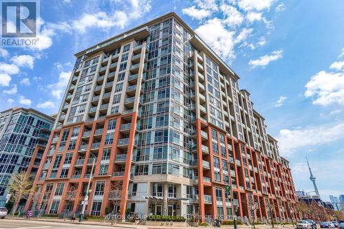 1124 - 1 Shaw Street, Toronto, ON - Outdoor With Balcony With Facade