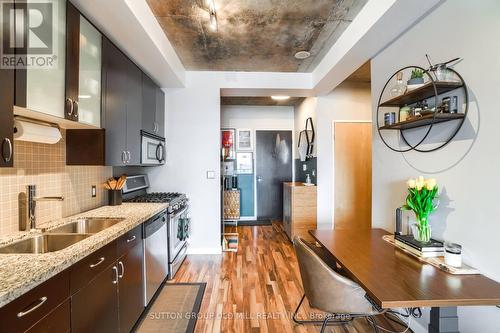 1124 - 1 Shaw Street, Toronto, ON - Indoor Photo Showing Kitchen With Double Sink