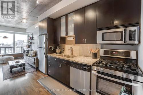 1124 - 1 Shaw Street, Toronto, ON - Indoor Photo Showing Kitchen With Double Sink