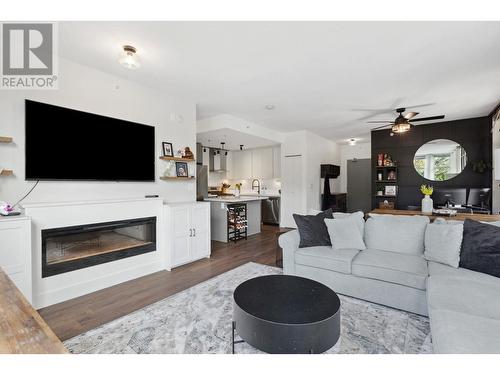 102 3602 Aldercrest Drive, North Vancouver, BC - Indoor Photo Showing Living Room With Fireplace