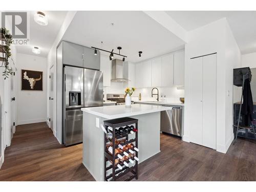 102 3602 Aldercrest Drive, North Vancouver, BC - Indoor Photo Showing Kitchen With Upgraded Kitchen