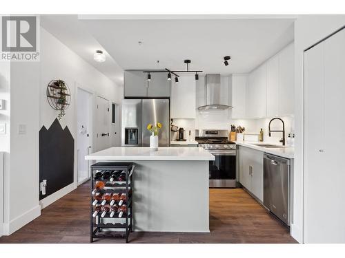 102 3602 Aldercrest Drive, North Vancouver, BC - Indoor Photo Showing Kitchen With Upgraded Kitchen