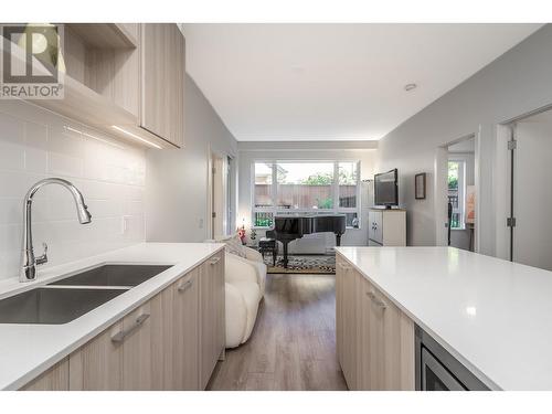 109 741 Anskar Court, Coquitlam, BC - Indoor Photo Showing Kitchen With Double Sink