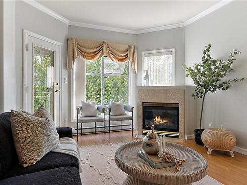 409-165 Kimta Rd, Victoria, BC - Indoor Photo Showing Living Room With Fireplace