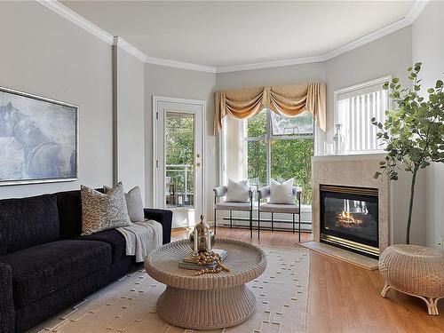 409-165 Kimta Rd, Victoria, BC - Indoor Photo Showing Living Room With Fireplace