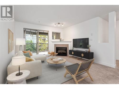 302 2468 Atkins Avenue, Port Coquitlam, BC - Indoor Photo Showing Living Room With Fireplace