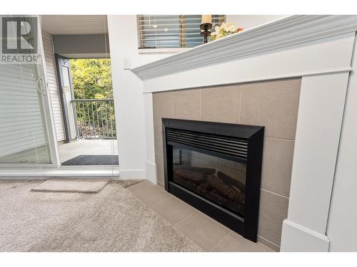 302 2468 Atkins Avenue, Port Coquitlam, BC - Indoor Photo Showing Living Room With Fireplace