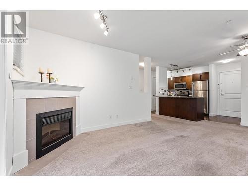 302 2468 Atkins Avenue, Port Coquitlam, BC - Indoor Photo Showing Living Room With Fireplace