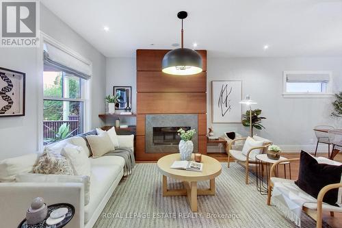 97 Strathcona Avenue, Toronto (Blake-Jones), ON - Indoor Photo Showing Living Room With Fireplace