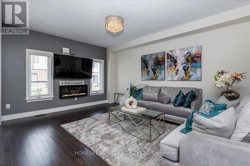 32 Peacock Trail, New Tecumseth, ON - Indoor Photo Showing Living Room With Fireplace