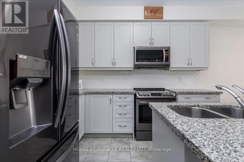 32 Peacock Trail, New Tecumseth, ON - Indoor Photo Showing Kitchen With Double Sink