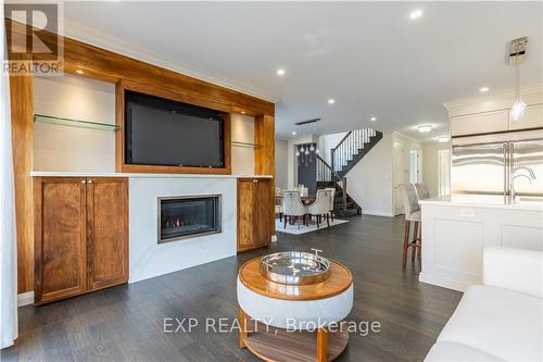 7 - 35 Midhurst Heights, Hamilton, ON - Indoor Photo Showing Living Room With Fireplace