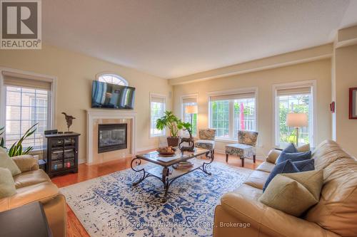 2386 Wasaga Drive, Oakville, ON - Indoor Photo Showing Living Room With Fireplace