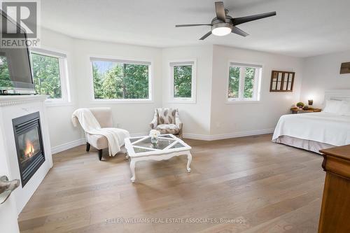 27 Gooderham Drive, Halton Hills (Georgetown), ON - Indoor Photo Showing Bedroom With Fireplace