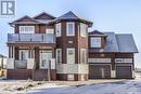 116 Emerald Ridge E, White City, SK  - Outdoor With Balcony With Facade 