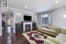 116 Emerald Ridge E, White City, SK  - Indoor Photo Showing Living Room With Fireplace 