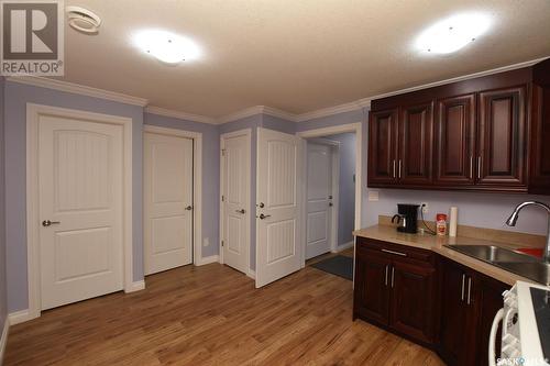 116 Emerald Ridge E, White City, SK - Indoor Photo Showing Kitchen With Double Sink