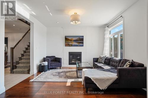 1516 North Wenige Drive, London, ON - Indoor Photo Showing Living Room With Fireplace