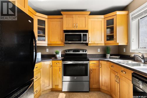 2778 Schweitzer Drive, Regina, SK - Indoor Photo Showing Kitchen With Double Sink