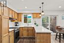 35 Pooles Road, Springwater (Midhurst), ON  - Indoor Photo Showing Kitchen With Double Sink 