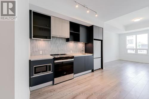 131 - 3020 Trailside Drive, Oakville, ON - Indoor Photo Showing Kitchen