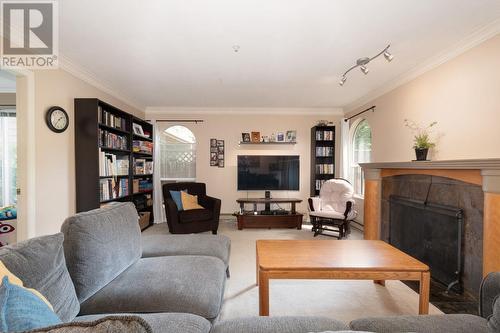 205 1000 Bowron Court, North Vancouver, BC - Indoor Photo Showing Living Room With Fireplace