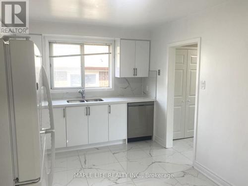 9 Foxhound Court, Toronto, ON - Indoor Photo Showing Kitchen With Double Sink