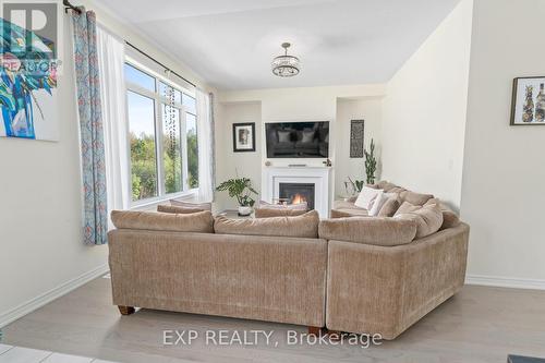 460 Black Cherry Crescent, Shelburne, ON - Indoor Photo Showing Living Room With Fireplace