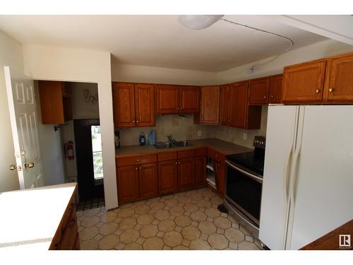 11920 69 St Nw, Edmonton, AB - Indoor Photo Showing Kitchen With Double Sink