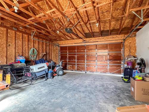 60064 87 Road W, North Cypress Rm, MB - Indoor Photo Showing Garage