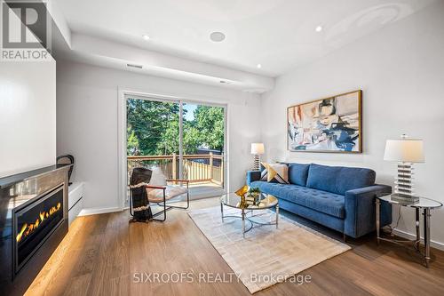 42 Orley Avenue, Toronto (Woodbine-Lumsden), ON - Indoor Photo Showing Living Room With Fireplace