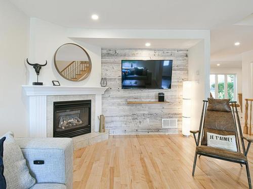 Salon - 162 Rue De Fontenelle, Blainville, QC - Indoor Photo Showing Living Room With Fireplace