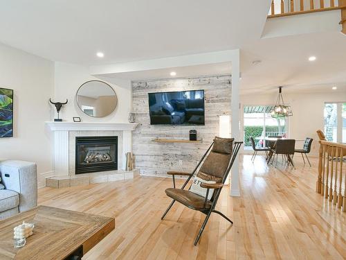 Salon - 162 Rue De Fontenelle, Blainville, QC - Indoor Photo Showing Living Room With Fireplace