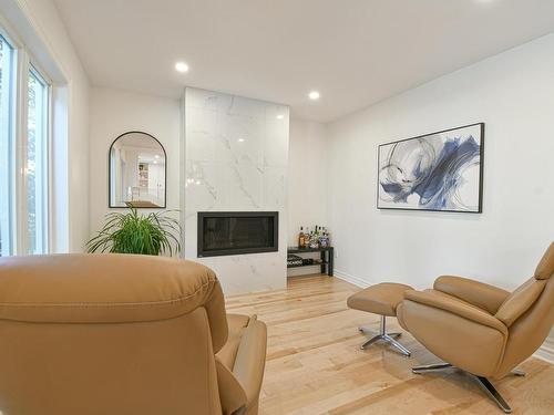 Salon - 162 Rue De Fontenelle, Blainville, QC - Indoor Photo Showing Living Room With Fireplace