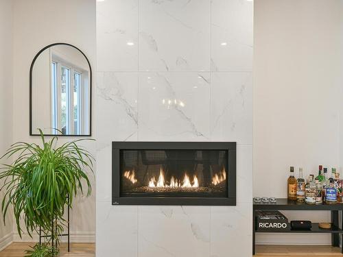 Salon - 162 Rue De Fontenelle, Blainville, QC - Indoor With Fireplace