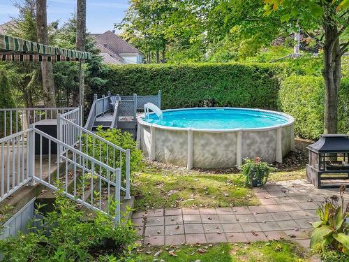 Photo aÃ©rienne - 162 Rue De Fontenelle, Blainville, QC - Outdoor With Above Ground Pool