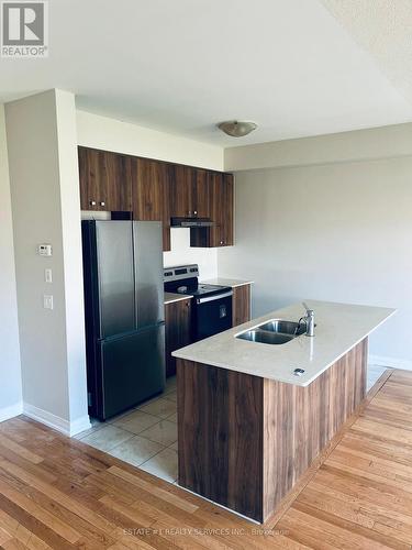 163 Freedom Crescent, Hamilton (Mount Hope), ON - Indoor Photo Showing Kitchen With Double Sink