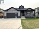 224 Valley Meadow Court, Swift Current, SK  - Outdoor With Deck Patio Veranda With Facade 