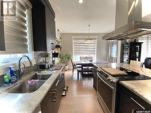 224 Valley Meadow Court, Swift Current, SK - Indoor Photo Showing Kitchen With Double Sink With Upgraded Kitchen