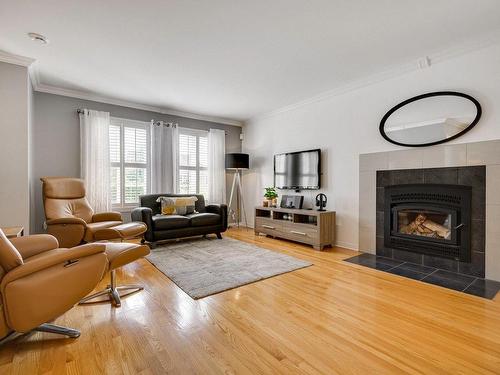 Salon - 1103 Rue Cousineau, Prévost, QC - Indoor Photo Showing Living Room With Fireplace