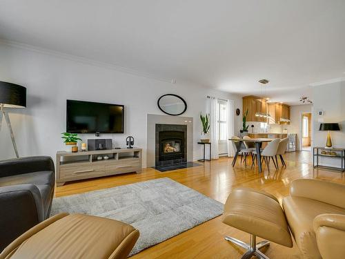 Salon - 1103 Rue Cousineau, Prévost, QC - Indoor Photo Showing Living Room With Fireplace