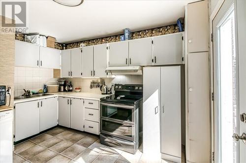 23 Racicot, Greater Sudbury, ON - Indoor Photo Showing Kitchen With Double Sink