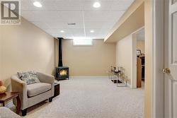 Professionally finished basement with gas fireplace - 