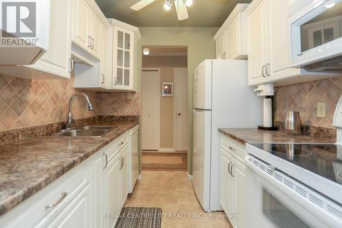 224 - 440 Wellington Street, St. Thomas, ON - Indoor Photo Showing Kitchen With Double Sink