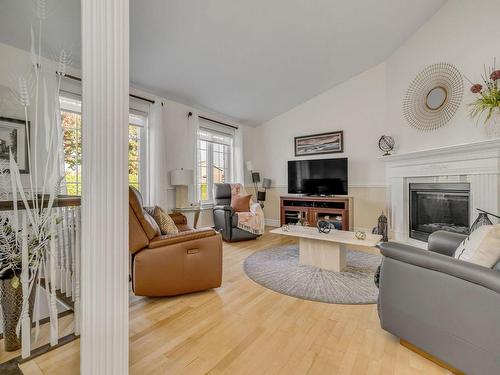 Salon - 828 Rue André-Garant, Lévis (Desjardins), QC - Indoor Photo Showing Living Room With Fireplace