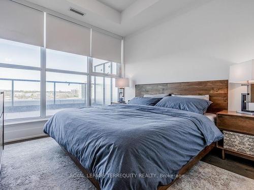 702-1063 Douglas Mccurdy Comm, Mississauga, ON - Indoor Photo Showing Bedroom