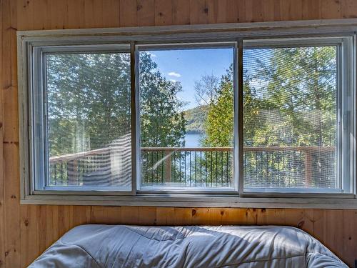 Aerial photo - 399 Ch. Du Lac-Chevreuil, Amherst, QC - Indoor Photo Showing Bedroom